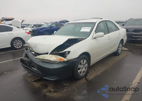 2002 Toyota Camry Le from USA, damaged, VIN 4T1BE32K32U595752